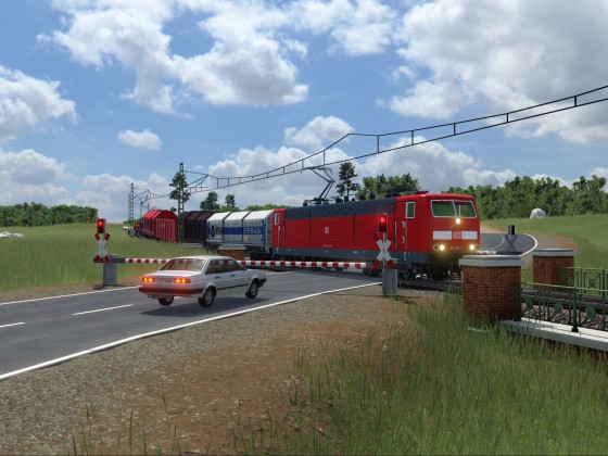 BR 181 zieht Güterzug über BÜ! (16.12.2023)