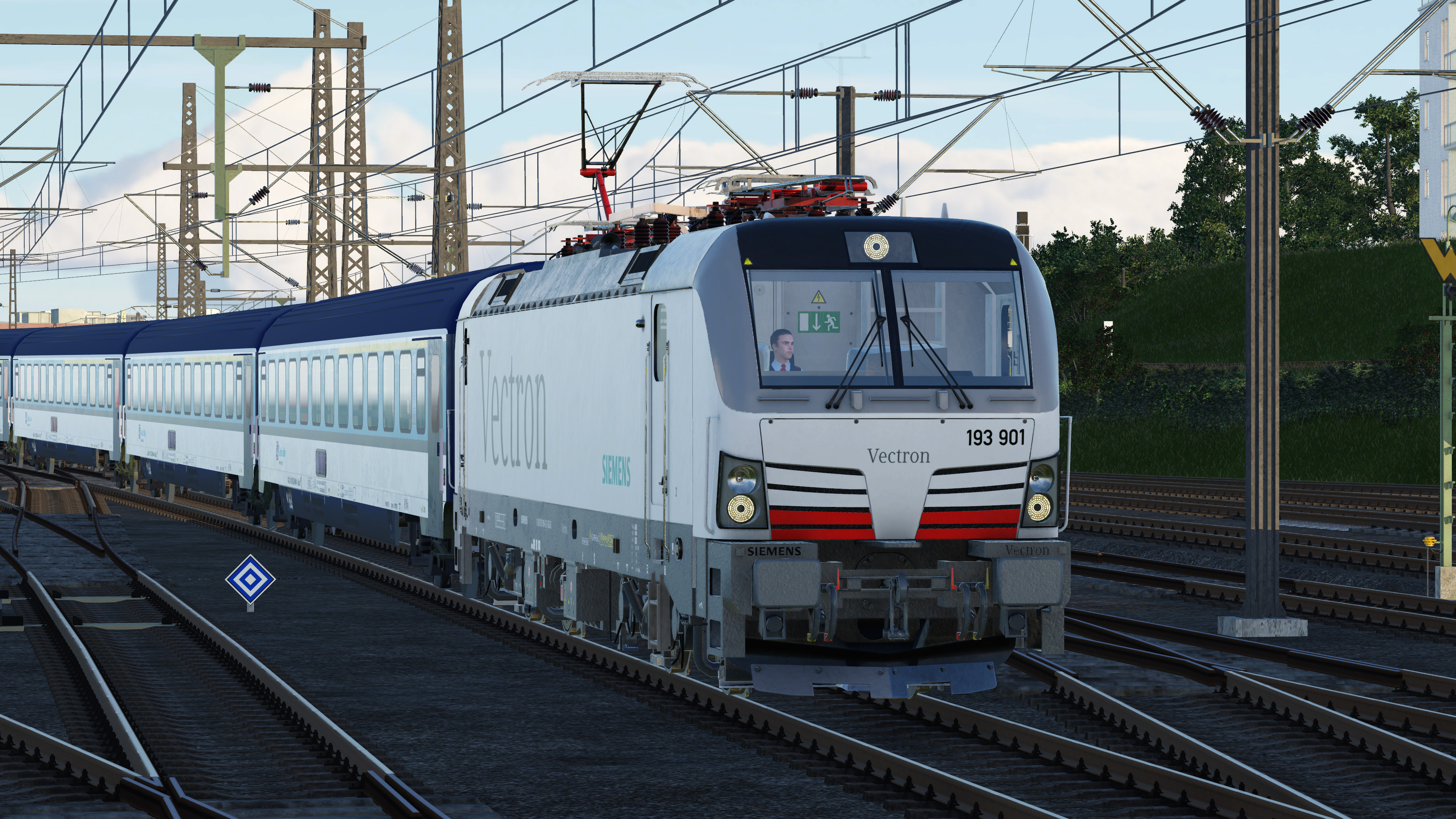 Vectron fährt am späten Abend in Kiel Hbf ein