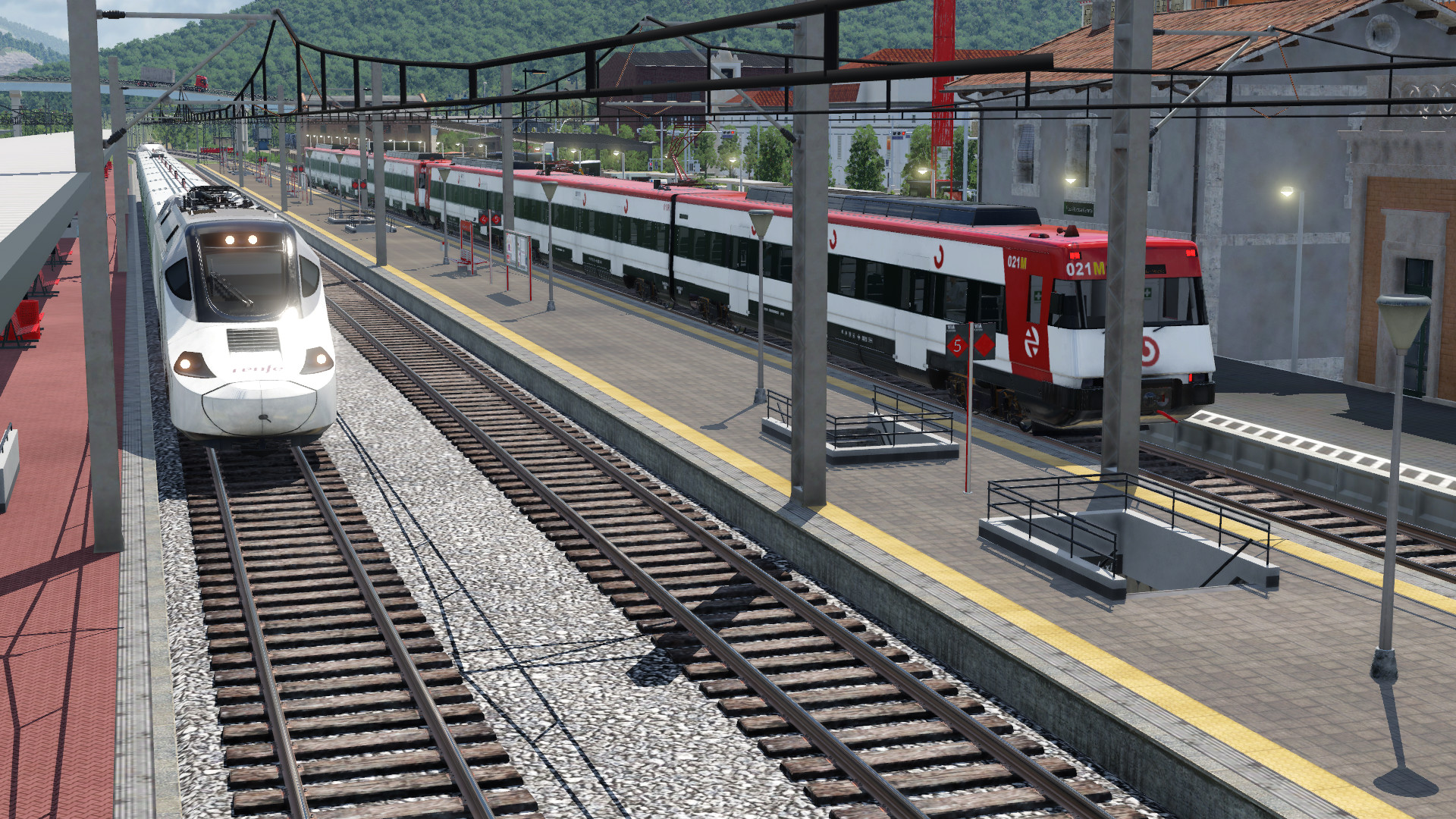 Renfe cercanías y Renfe AVE en parada