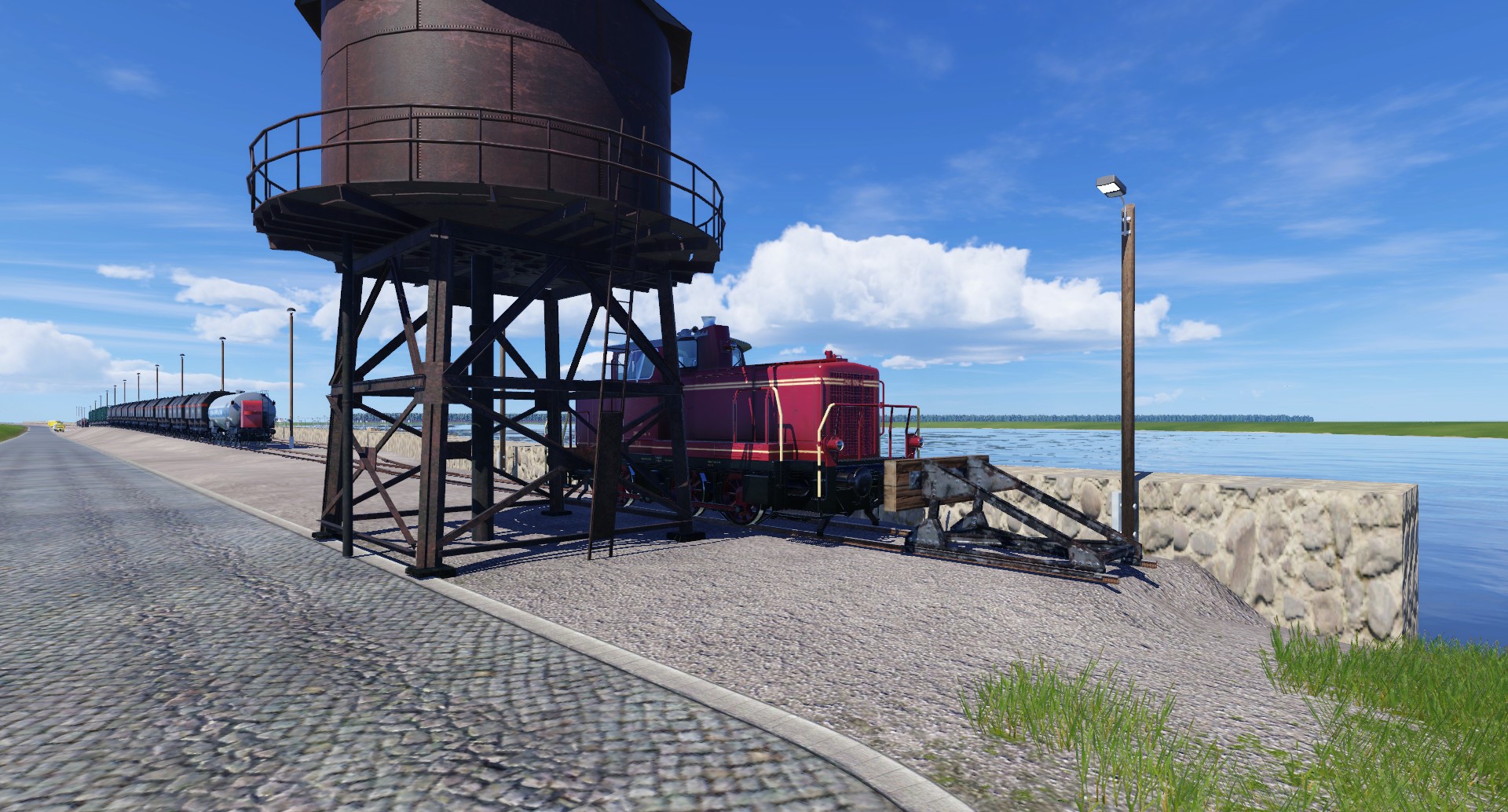Ein Blick auf dem Wasserturm und der Diesellok der Hafenbahn