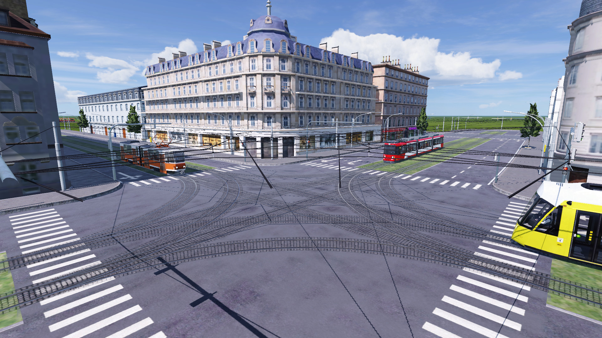 3 Straßenbahnen treffen sich an der Straßenkreuzung