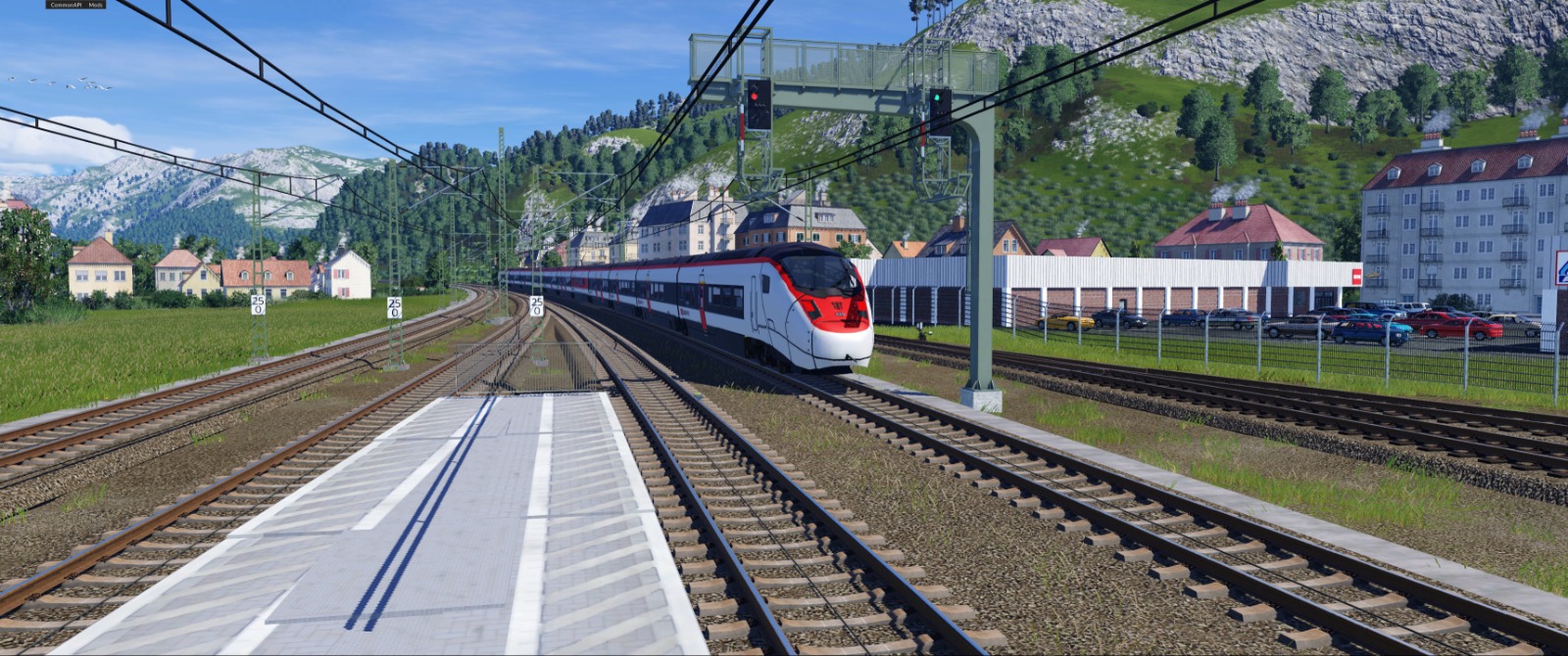 Giruno rauscht an Bahnhof vorbei