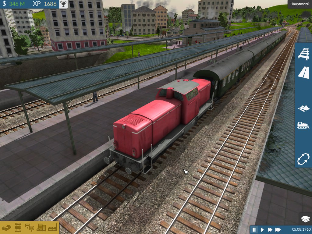 V 100 mit Eilzug bei Bahnhofsausfahrt