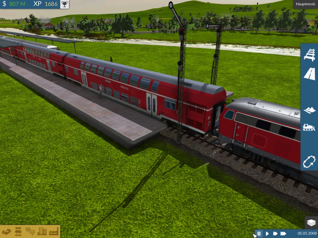 BR 218 mit Regionalexpress bei Bahnhofsausfahrt