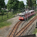 Meterspurbahnhöfe mit Schotterbahnsteigen
