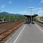 Ein noch unfertiger Bahnhof im ebenfalls unfertigen Gebirge