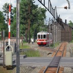 Meterspurbahnhöfe mit Schotterbahnsteigen