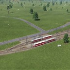 Meterspurbahnhöfe mit Schotterbahnsteigen