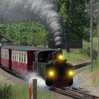 Schmalspurlok Henschel HF 110 (konvertiert) mit den sächsischen Personenwagen in beige/rot