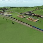 Voll beladener Güterzug bei der Einfahrt in die Container Station