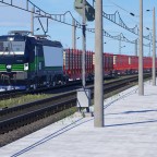 ELL Vectron mit einem Güterzug