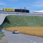 BR 155 von EBS begegnet einem ICE T auf einem Bahndamm
