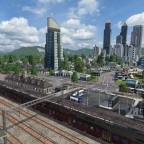 Blick auf Neubraunshain vom Bahnhof mit Firmenzentrale im Vordergrund