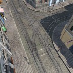 Kreuzung mit überbreitem Gehweg und 10-m-Tramkurve