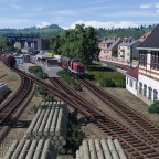 Blick auf die kleine Stadt am Bodensee mit dem kleinen Umschlagbahnof für Holz 4