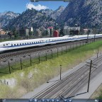 Shinkansen N700 series train passing at speed in Maibara City