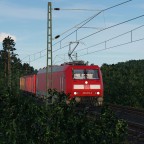 BR 185.1 mit offenem Güterwagen Zug