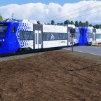 Stadler RS1/BR 650 von Vlexx bei einem BÜ
