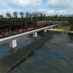 Br53 mit Güteran die brücke
