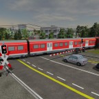 S-Bahn am Bahnübergang zur Endstation