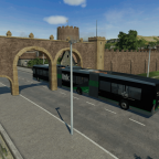 Doppelgelenkbus auf dem Weg in die Burg von hinten