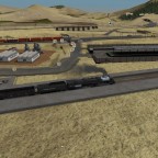 Big-Boy dropping off iron and coal, Goodstrains and a passanger train in background