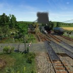 Personenzug bei der Durchfahrt durch die Anschlussstelle Etschberg-Sägewerk #2