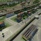 Wohnblocks, Schrebergärten & Betriebswerk im Hintergrund