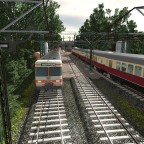 ET 420 und Br 103 kommen aus dem Depot, im Hintergrund noch ein "Eierkopf" Triebwagen