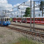 Meterspurbahnhöfe mit Schotterbahnsteigen