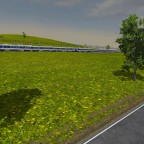 Blick von der Schnellstraße auf die 4020 in einer 3er Traktion