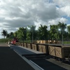 Feldbahn fährt auf Bauernhof und Industrieanlage "Lebensmittelfabrik"