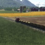 Feldbahn fährt auf Bauernhof und Industrieanlage "Lebensmittelfabrik"
