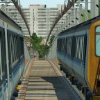 Two Class 156s (for Glossop - Left and for Piccadilly -Right) pass over the M6 outside Manchester