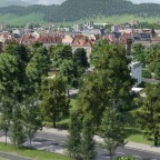 Blick von Osten auf Schulanlage und Grüngürtel