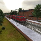 Br 110 mit Mittelstädter Waggons in Rot mit Wittenberger Kopf.